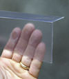 Closeup of a clear plastic covering on a Pennsylvania Furnace crawl space block wall