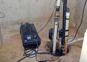 Pedestal sump pump system installed in a home in Reynoldsville