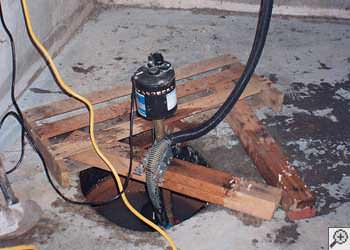 A Reynoldsville sump pump system that failed and lead to a basement flood.