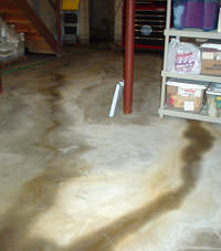Flooding entering a basement through a floor crack in Emporium