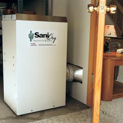A basement dehumidifier with an ENERGY STAR® rating ducting dry air into a finished area of the basement  in Cherry Tree