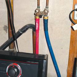 Washer hoses in a basement  in West Decatur