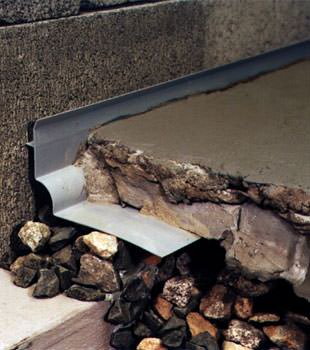 a custom designed basement drain system for thin basement floors in Johnsonburg.