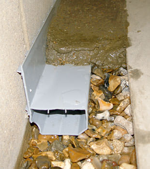 A basement drain system installed in a Port Matilda home