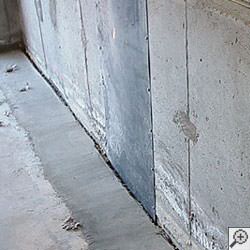 an ugly basement weeping tile drainage system that's clogged and not working in Saint Marys.