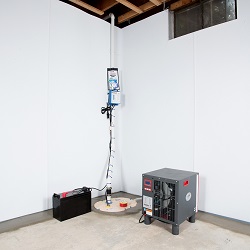 Sump pump system, dehumidifier, and basement wall panels installed during a sump pump installation in Philipsburg