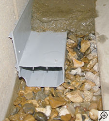 A no-clog basement french drain system installed in Kersey