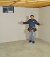 Port Matilda basement insulation covered by EverLast™ wall paneling, with SilverGlo™ insulation underneath