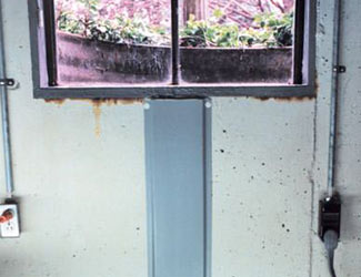 Repaired waterproofed basement window leak in Saint Marys