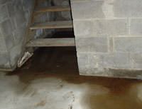 Water Pouring into a Pennsylvania Furnace Basement through Hatchway Doors